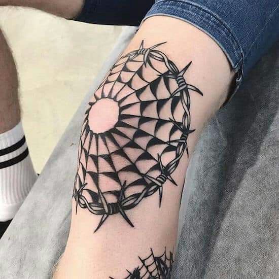 a person with a tattoo on their arm