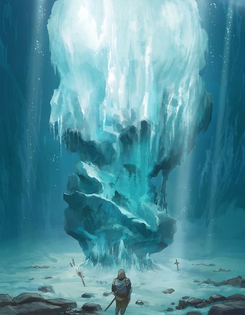 a man standing in front of an ice cave