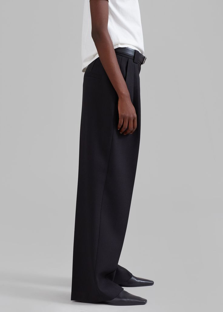 Color: Black Traditional woven suiting fabric Relaxed fit Wide leg High rise Front pleated detailing Traveler's crease Side seam hip pockets Illusion back welted pockets Hook and bar closure Zip fly Unlined 79% Polyester 19% Rayon 2% Polyurethane Gentle Machine Wash Imported Suiting Fabric, Pin Tucks, Wide Leg, Fashion Inspo, High Rise, Trousers, Relaxed Fit, Bar, Fabric