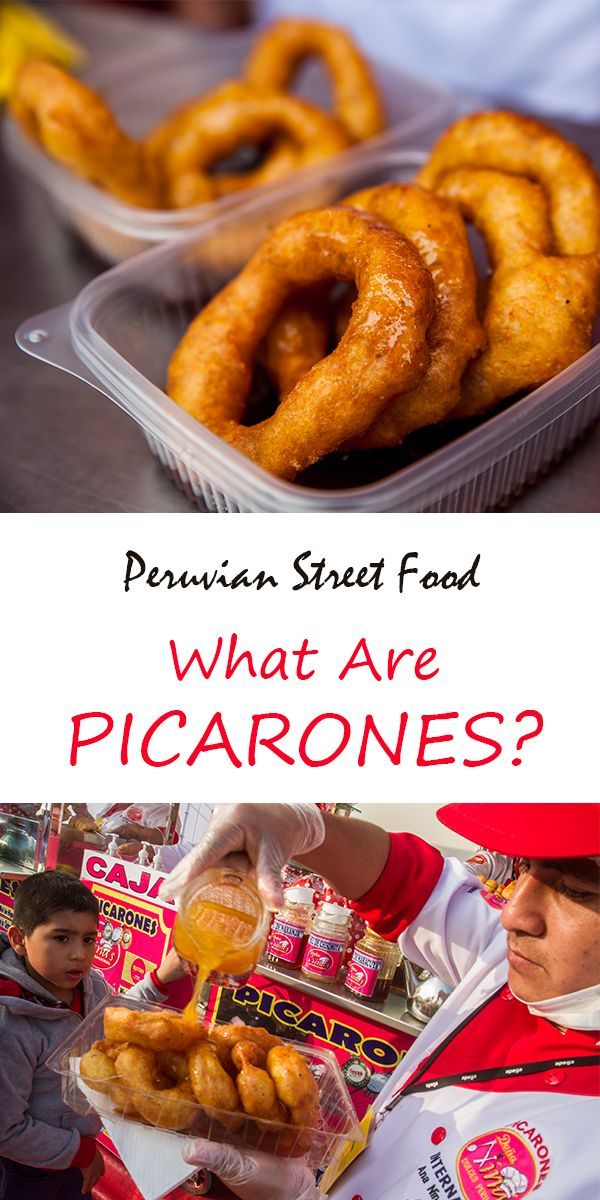 what are picarones in plastic containers on a table with other foods and people standing around