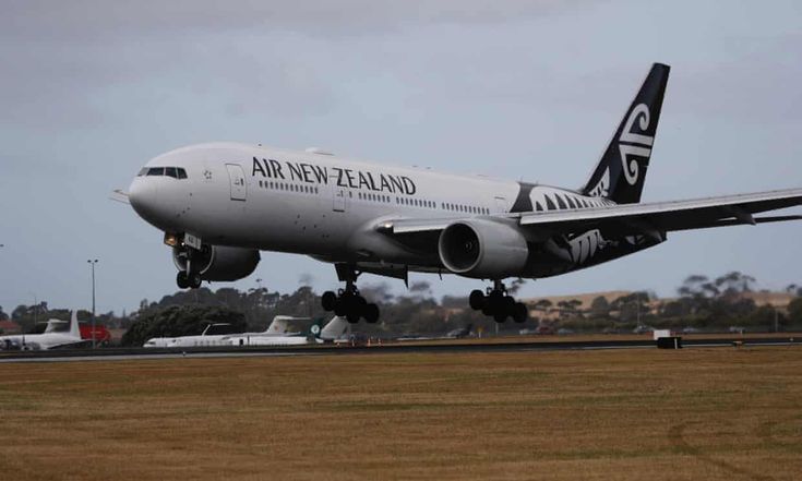 an air new zealand jet taking off from the runway