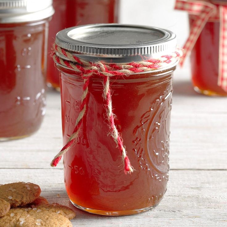 cookies and jam in jars on a table