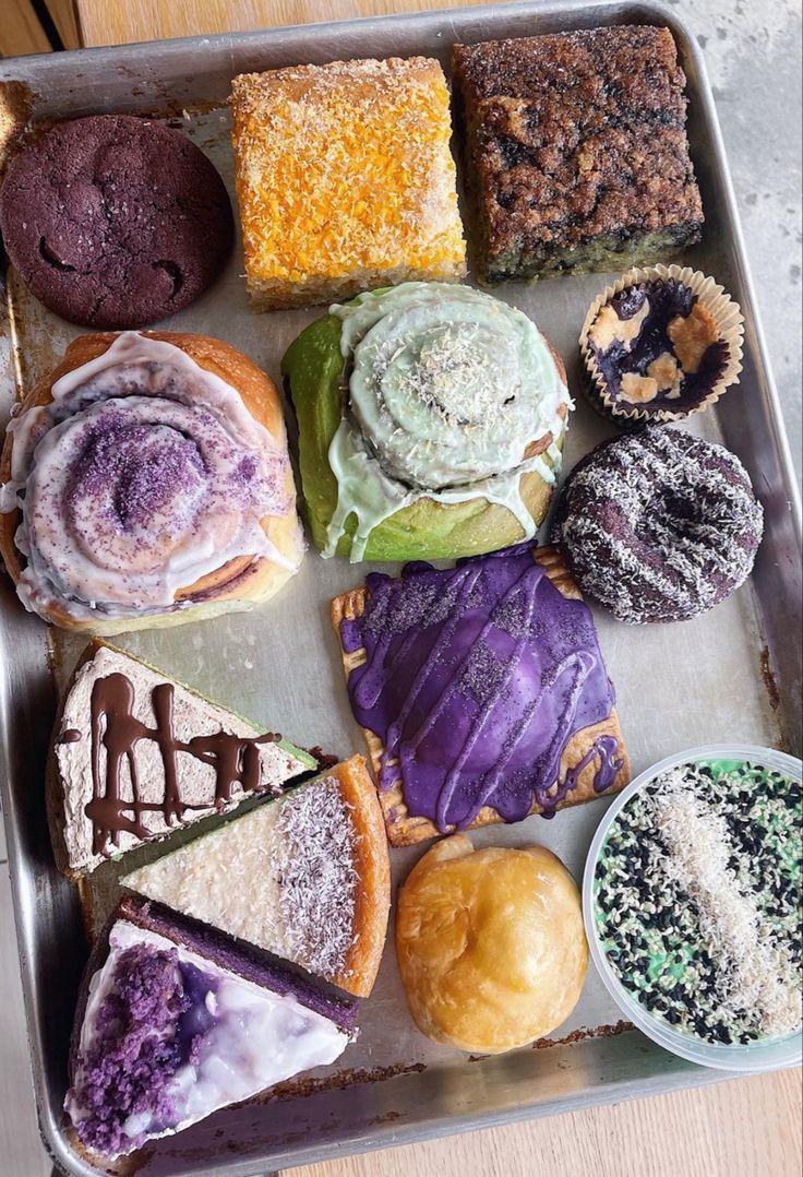 a tray filled with different types of pastries