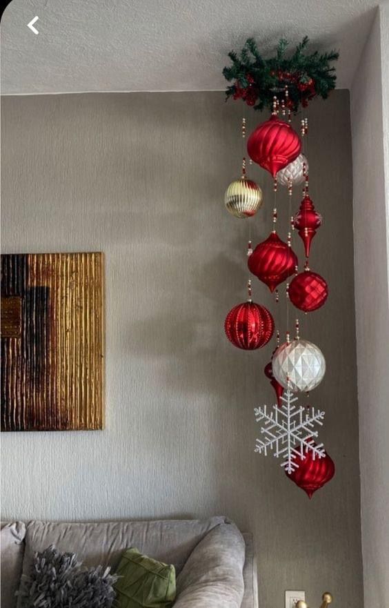 a living room with ornaments hanging from the ceiling