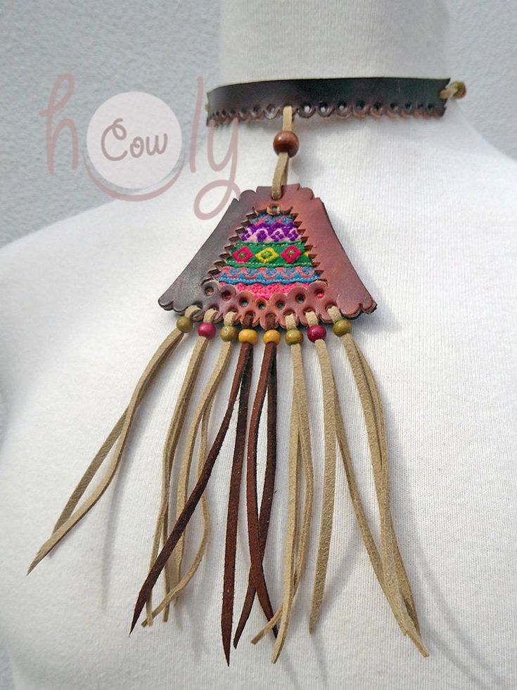 Unleash your bohemian soul with this beautiful one off unique handmade leather necklace. It is made from the finest quality brown leather. The brown leather section of the necklace has vintage hand embroidered Hmong tribal fabric incorporated into it's design. This is not only a necklace it is a piece of art. This long fringe leather choker necklace is adjustable at the back so it fits all sizes. Available in a wide range of colors. Please contact me if you would prefer a different color combina Adjustable Brown Hippie Choker, Handmade Leather Choker Necklace, Adjustable Leather Vintage Necklace, Vintage Adjustable Leather Necklace, Traditional Leather Jewelry For Festival, Bohemian Brown Beaded Choker, Handmade Brown Hippie Choker, Hand-stitched Adjustable Bohemian Jewelry, Artisan Hand-stitched Festival Jewelry