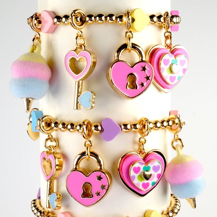 Show them just how much you HEART them with this Heart Lock charm and bring on the love and smiles! Add this charm to any CHARM IT! bracelet or necklace and customize her collection! features & materials: Enamel, Base Metal WARNING: Choking Hazard - Small parts. Not for children under 3 years. Dopamine Jewelry, Gold Glitter Nail Polish, Feminine Girl, Charm It, Gold Glitter Nails, Unicorn Charm, Disney Charms, Gold Book, Charm Collection