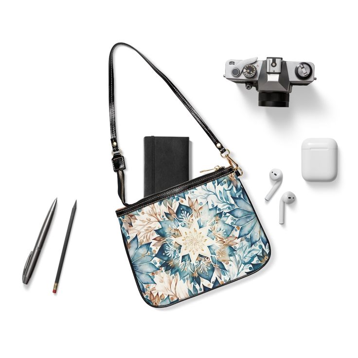 Looking for an accessory that can elevate your outfit while carrying your essentials? Check out our Teal and Tan Floral Mandala Compact Shoulder Bag! Made with high-grade cruelty-free PU leather, this bag is ethically made and stylish. You'll love the double-sided print featuring a beautiful mandala design that can add a bold touch to any outfit. The gold-colored zipper and hardware add a touch of glam, while the polyester lining keeps your items safe and secure. With its lightweight constructio Trendy Phone Bag With Detachable Strap For Everyday Use, Trendy Phone Shoulder Bag, Trendy Phone Bag With Removable Pouch For Everyday, Trendy Pouch Satchel For Daily Use, Trendy Satchel Bag With Cell Phone Pocket, Trendy Satchel Pouch For Daily Use, Trendy Satchel With Cell Phone Pocket, Daily Use Shoulder Bag Pouch, Trendy Daily Use Pouch Satchel