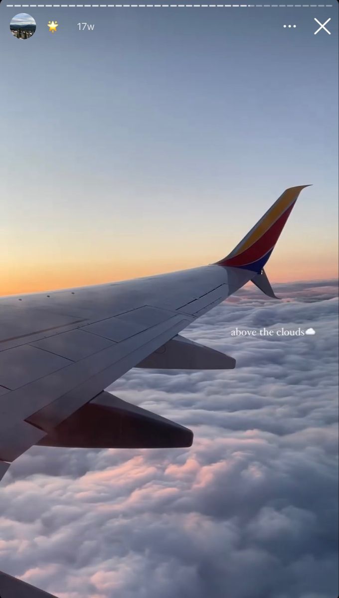 an airplane wing flying above the clouds at sunset or sunrise with text below it that reads, i love the clouds