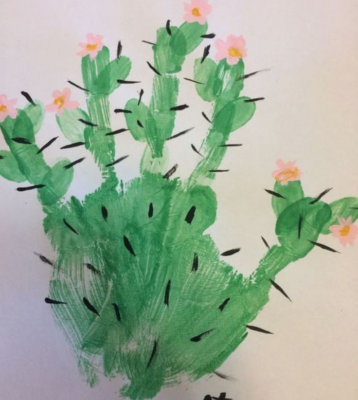 a child's drawing of a green cactus