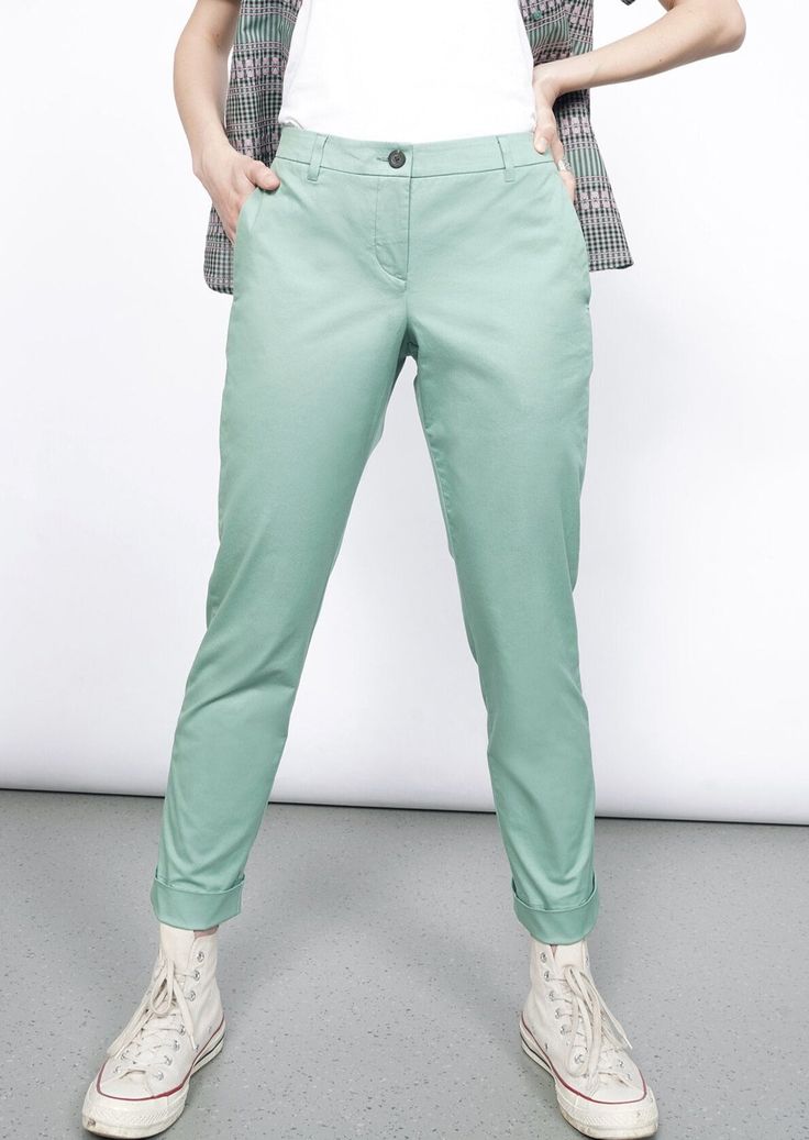 With the right amount of stretch for ease and comfort where you need it, our classic trouser is a true wardrobe staple. The convertible cuff allows you to roll up to crop at your ankle, or extend for a full length pant in a snap. FIT + FEATURES 98% Cotton, 2% Spandex Relaxed mid rise fit. Full length tapered leg.   One button waist closure Zipper fly 2 side slant + 2 back flap pockets with buttons Rollable cuff Polyester/Cotton lining 30" inseam 0-18, 32" inseam 20W-26W MODEL DETAILS Maria (she/ Classic Trousers, Trouser Pants Women, Jumpsuit Trousers, Floral Pants, Drawstring Pants, Trouser Pants, Roll Up, Straight Leg Pants, Cropped Pants