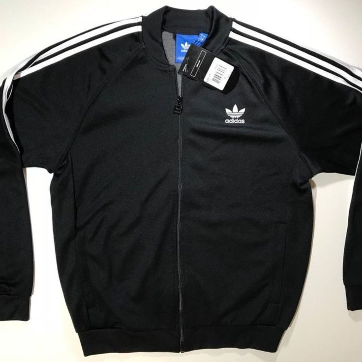 Adidas Sst Tt Originals Superstar Track Top Jacket Black Bk5921 Size S New With Tag Adidas Black Track Jacket For Spring, Spring Adidas Black Track Jacket, Black Track Jacket With Three Stripes For Winter, Black Athleisure Outerwear With Three Stripes, Black Crew Neck Track Jacket For Fall, Adidas Track Jacket With Ribbed Cuffs For Streetwear, Black Crew Neck Track Jacket For Winter, Black Track Jacket With Three Stripes For Outdoor, Functional Black Track Jacket For Spring