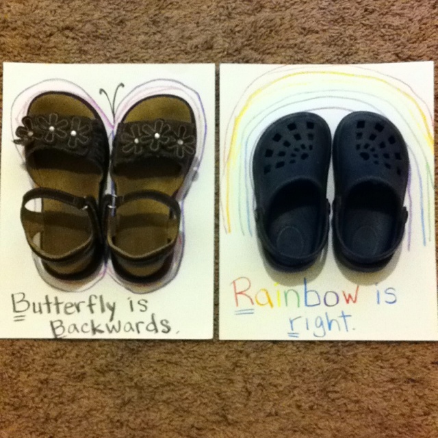 two pairs of shoes sitting on top of a white paper with words written below them