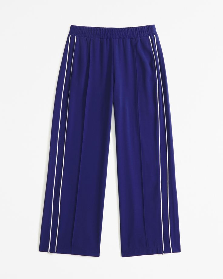 Mid rise, wide leg pants in a drapey rayon fabric, featuring a pull-on style elasticated waistband and functional pockets. Active Swimwear, Track Pants Women, Swimwear Suits, Fall 24, Track Pant, American Clothing, Pocket Bag, Suits Coats, Rayon Fabric