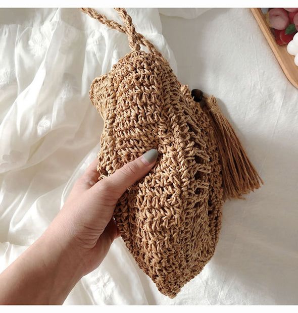 Summer Beach Shoulder Bag Made From Palm Leaf, Vacation Straw Bag With Braided Handles, Bohemian Lightweight Tote Shoulder Bag, Lightweight Beige Straw Bag For Beach Season, Casual Adjustable Natural Straw Bag, Bohemian Beach Bag In Natural Fiber For Vacation, Beige Lightweight Straw Bag For Beach, Bohemian Lightweight Bags For Beach Season, Lightweight Beige Straw Bag For Beach