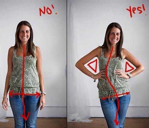 a woman standing in front of a white wall with no yes signs on the walls