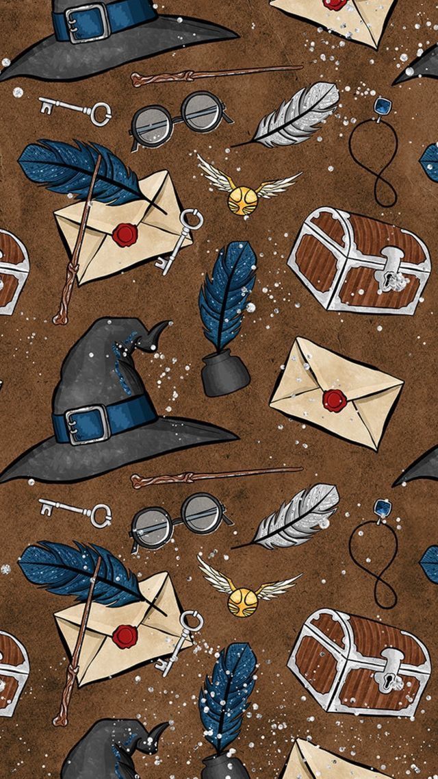 a brown background with many different items on top of it, including an envelope and some feathers