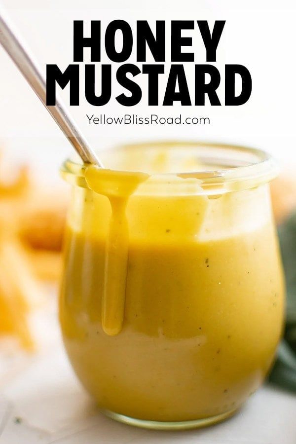 honey mustard in a glass jar with a spoon