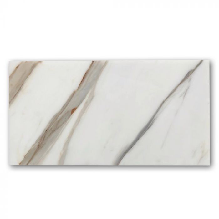 a white marble tile with brown lines on it