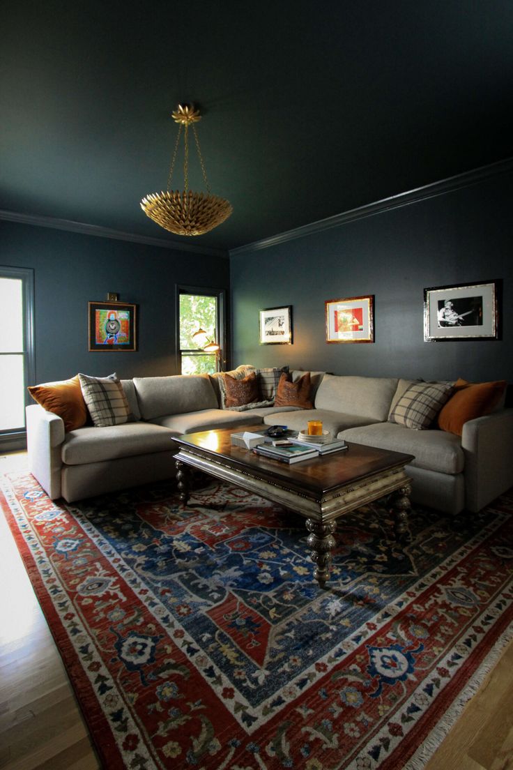 a living room filled with furniture and a rug