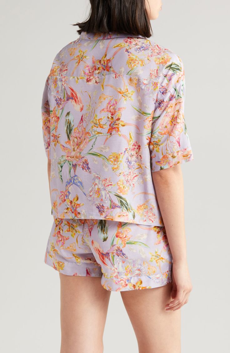 Drift off to the dreamland in watercolor floral PJs made from an incredibly lightweight blend of cotton and silk. 21" length, 3" inseam; 28" leg opening; 12" front rise; 16" back rise (size medium) Top has notched collar; short sleeves Shorts have elastic waist 80% cotton, 20% silk Hand wash, line dry Imported Silk Pajamas Shorts, Silk Pajama Pants, Cotton Pajama Shorts, French Rose, Silk Shorts, Silk Pajamas, Cotton Pyjamas, Pajama Shorts, Embroidered Silk