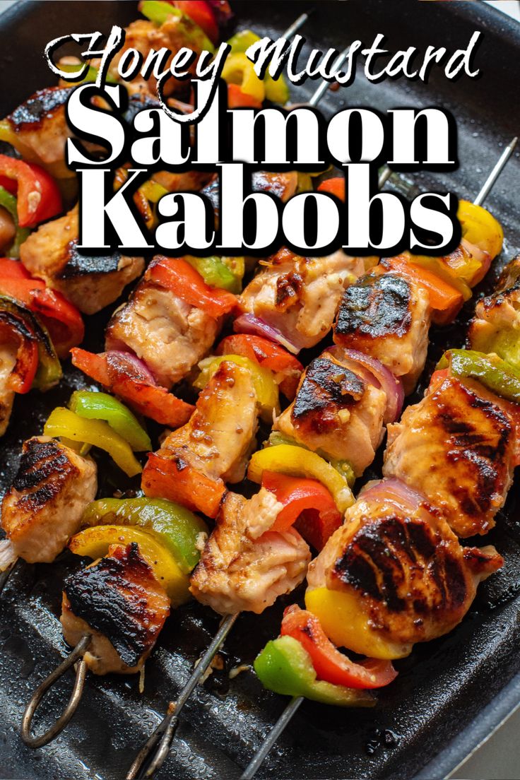 chicken and vegetable kabobs on a grill with the title honey mustard salmon kabobs