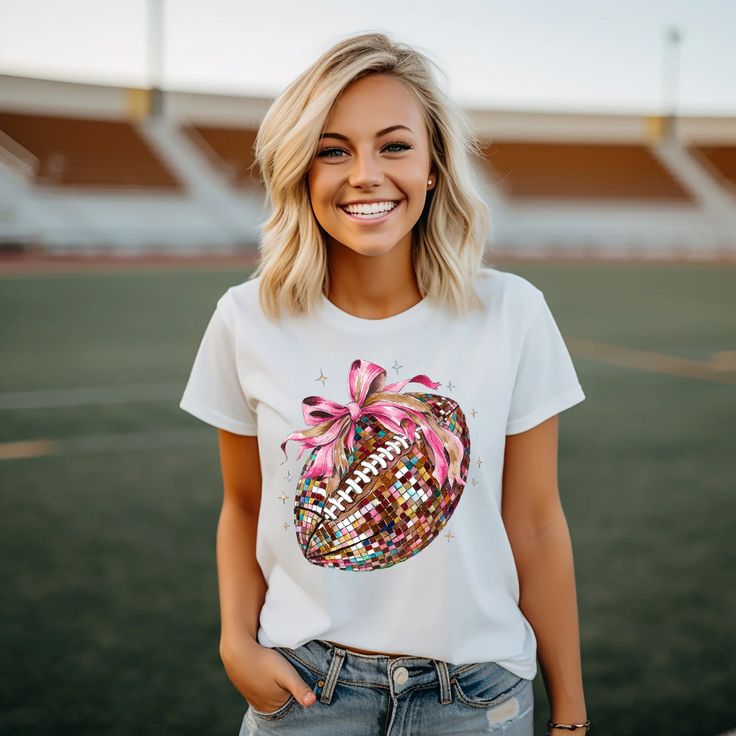 Disco Football Women's Shirt Attention all football fans! The perfect shirt for game day has arrived! Whether you prefer short sleeves or crewneck sweatshirts, these fun graphic shirts have got you covered for the upcoming fall football season! School Spirit T-shirt For Cheerleading In Fall, Football Fan T-shirt With Heat Transfer Vinyl, Football Season Sports Fan T-shirt With Sublimation Print, Football Season Fan Apparel T-shirt With Heat Transfer Vinyl, Game Day Football Season Graphic Tee, Crew Neck Tops For Football Season Game Day, Football Season School Spirit T-shirt With Short Sleeves, Sports Fan Tops With Sublimation Print For Game Day, Team-colored T-shirt For Game Day In Fall