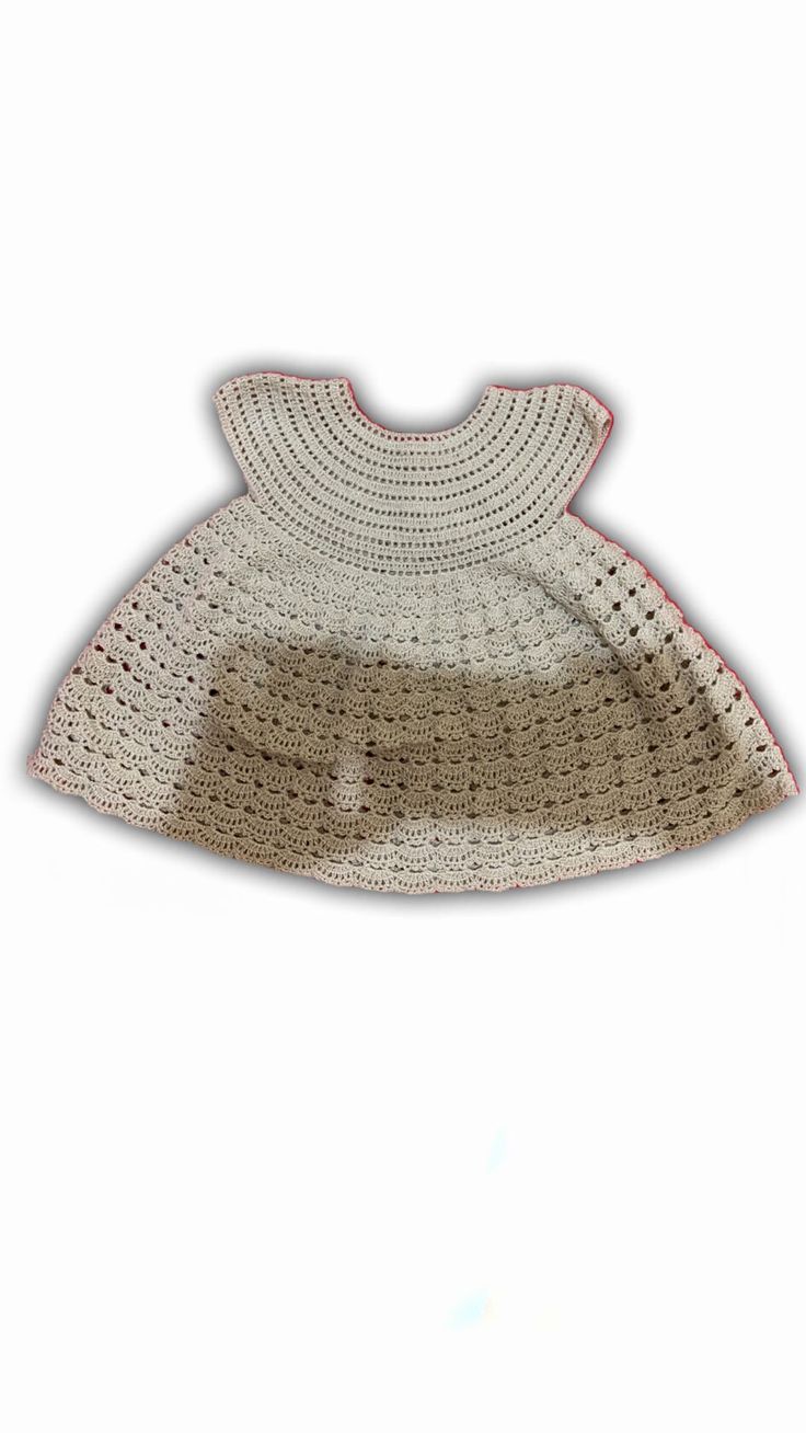 a crocheted baby's bib on a white background