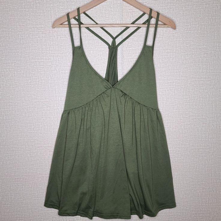 Green Strappy Racerback Flowy Tank New Without Tags. No Brand. Size: Xl Casual Summer Tank Top With Strappy Back, Summer Tank Top With Strappy Back, Chic Cross Back Tank Top For Summer, Summer Strappy Back Stretch Tank Top, Summer Beach Tank Top With Cross Back, Chic Strappy Back Tank Top For Beach, Strappy Back Stretch Tank Top For Summer, Stretch Strappy Back Tank Top For Summer, Summer Stretch Tank Top With Strappy Back