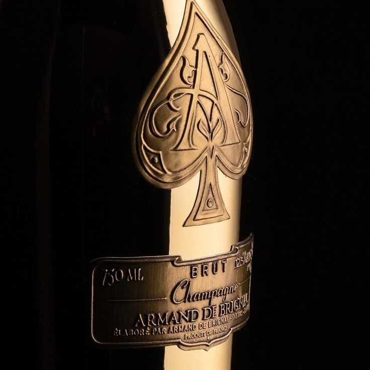 a bottle of champagne is shown in the dark