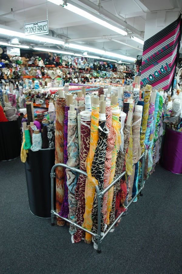 a shopping cart filled with lots of different colored items