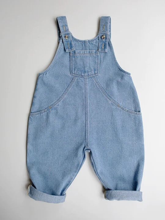 Made in classic cotton denim, our relaxed-fit dungaree is the perfect piece to live in all season. It features adjustable straps, and a comfy, oversized fit for carefree playdays indoors and out. We love it with The Pull-On Jacket and The Knit Scarf. Our small-batch wash process means that each of our denim garments wi Medium Wash Relaxed Fit Denim Jumpsuit With Bib Front, Relaxed Fit Denim Shortalls In Medium Wash, Medium Wash Denim Shortalls With Relaxed Fit, Medium Wash Denim Shortalls In Relaxed Fit, Medium Wash Relaxed Fit Bib Front Jeans, Medium Wash Denim Overalls With Adjustable Straps, Denim Blue Overalls With Adjustable Straps, Denim Blue Jumpsuit With Adjustable Straps, Denim Shortalls In Medium Wash With Bib Front