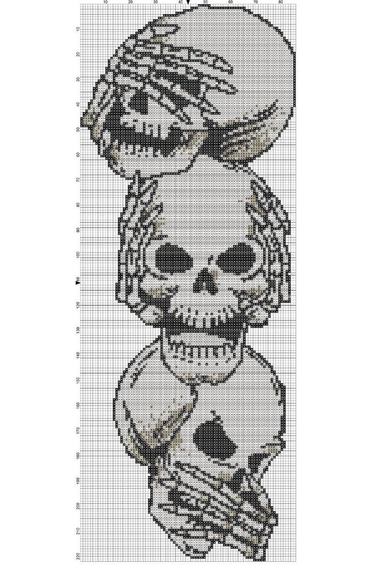 a cross stitch pattern with three skulls in the middle and one skull at the top