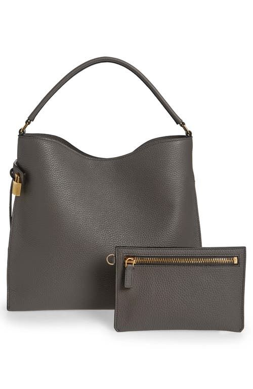 Find TOM FORD Alix Grain Leather Hobo Bag on Editorialist. The Alix hobo bag from TOM FORD is crafted in Italy from richly grained leather. It features gusseted sides and a gleaming vertical zip. The bag has a magnetic closure, a shoulder strap, an exterior zip pocket, an interior zip pocket, and a removable tethered zip pouch. It is lined with cotton and has a top handle. The bag is a small size and is made in Italy. Luxury Grained Texture Top Handle Shoulder Bag, Tom Ford Bags Handbags, Designer Bags With Grained Texture For Everyday Use, Luxury Grained Texture Shoulder Bag For Evening, Luxury Evening Shoulder Bag With Grained Texture, Luxury Grained Texture Evening Shoulder Bag, Luxury Everyday Bag With Grained Texture, Luxury Grained Texture Shoulder Bag For Everyday, Designer Evening Bags With Grained Texture