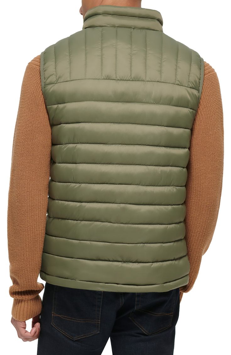 A quilted stand collar and lightweight fill insulate this heat-keeping puffer vest. 26 1/2" length (size Medium) Stand collar Front zip closure Front zip pockets Water resistant 100% nylon Machine wash, tumble dry Imported Cozy Gift, Man Up, Ted Baker London, Active Women, Luxury Gifts, Puffer Vest, Stand Collar, Boy's Clothing, Mother Gifts