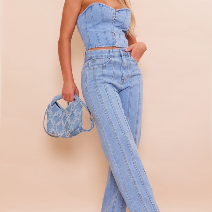 Light Blue - Two Piece Set- Jeans And Corset Top - Never Worn Chic Blue Straight Leg Jeans, Spring Cropped Denim Jeans, Chic Medium Wash Jeans For Day Out, Chic Medium Wash Jeans, Trendy Cropped Denim Jeans, Cropped Medium Wash Jeans For Day Out, Chic High Rise Light Blue Jeans, Chic Light Blue High Rise Jeans, Cropped Jeans For Spring Day Out