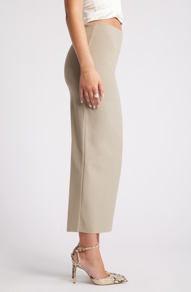 A smooth maxi skirt crafted from the brand's softest fabric contours to your silhouette for a look that easily transitions from the office to evening. 37" length (size Medium) Partially lined Concealed-elastic waist 75% nylon, 25% spandex Machine wash, tumble dry Imported Stretch Maxi Length Bottoms With Side Slits, Stretch Maxi Bottoms With Side Slits, Fitted Maxi Length Bottoms With Side Slits, Midi-length Bottoms With Elastic Waistband And Stretch, Fitted Midi Bottoms With Elastic Waistband, Workwear Elastane Maxi Skirt, Stretch Midi Bottoms With Elastic Waistband, Stretch Bottoms With Elastic Waistband And Midi Length, Formal Stretch Midi Bottoms