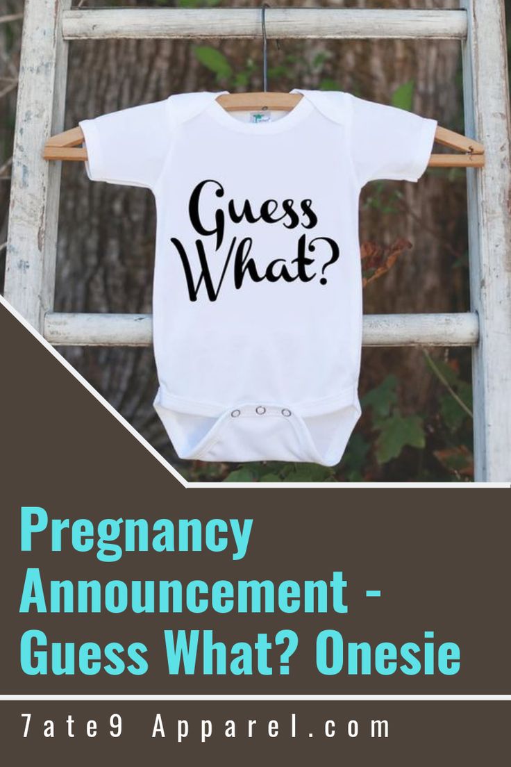 a baby's bodysuit with the words, pregnant announcement guess what?