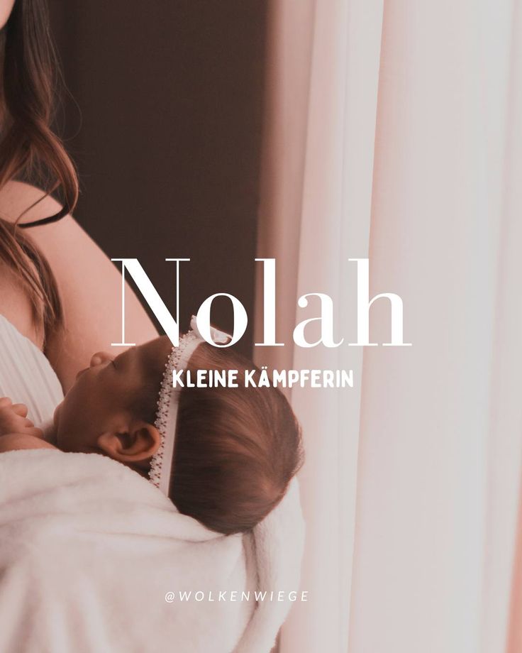 a woman holding a baby in her arms with the words nolah on it