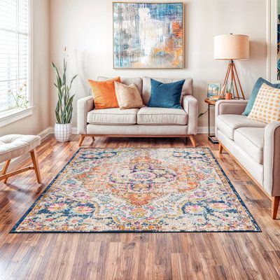 the living room is clean and ready to be used as a den or office space