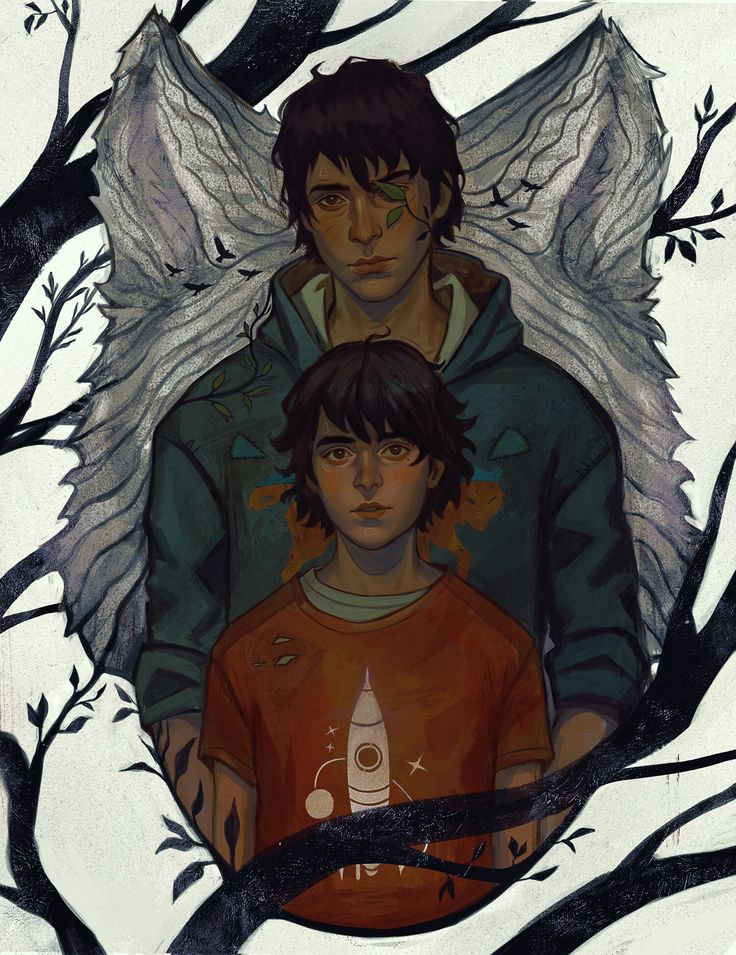 two young men standing next to each other in front of trees with white wings on them