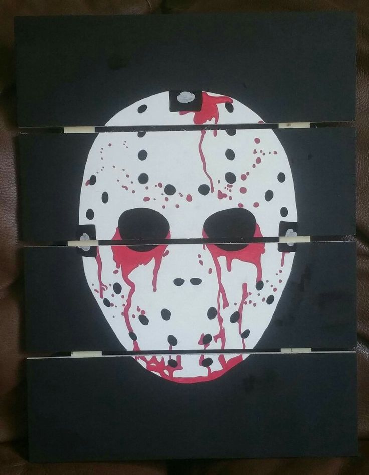 a painting of a hockey mask with blood on it