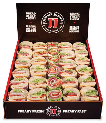 a display case filled with lots of different types of sandwiches in it's boxes