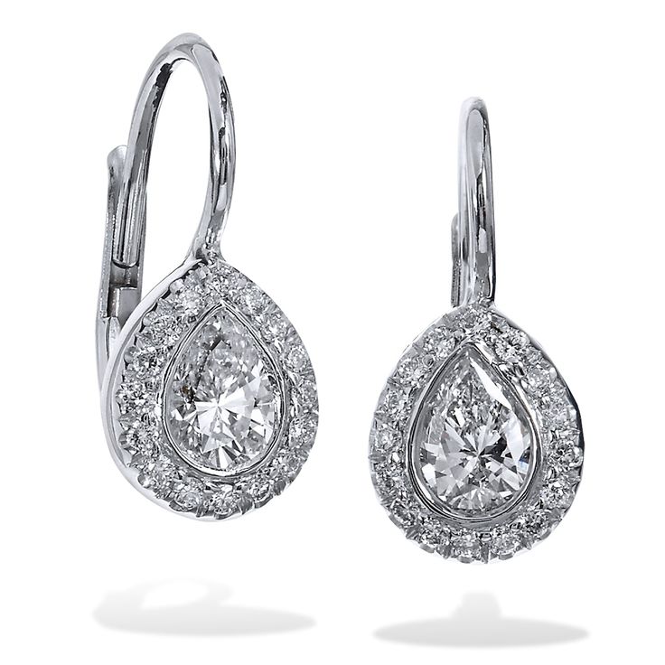 Two pear-shaped diamonds, with a total weight of 0.41 carat (F/G/SI), are set at the center and embraced by thirty-two pave-set diamonds with a total weight of 0.10 carat (G/H/VS) in these handmade 18 karat white gold lever-back earrings. Give her a gift as timeless as your love. SKU: 17626 Platinum Pear-shaped Diamond Earrings With Accents, Pear-shaped Single Cut Diamond Earrings, Platinum Teardrop Diamond Earrings With Brilliant Cut, Pear-shaped Diamond Earrings With Accents, Luxury Pear-shaped Diamond Earrings With Pave Setting, Platinum Teardrop Diamond Earrings With Accents, Teardrop Diamond Earrings With Accents In Platinum, Pear-shaped Brilliant Cut Diamond Earrings, White Gold Pear-shaped Diamond Earrings With Pave Setting