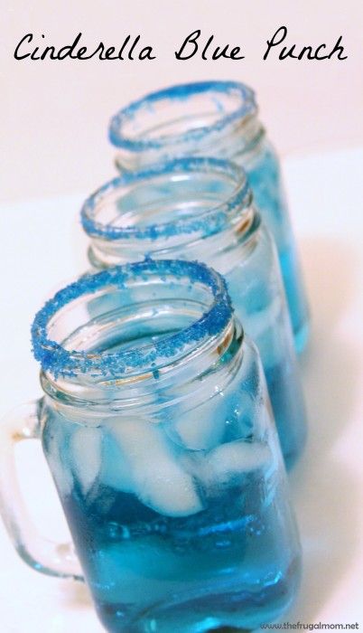 three mason jars filled with blue liquid and ice