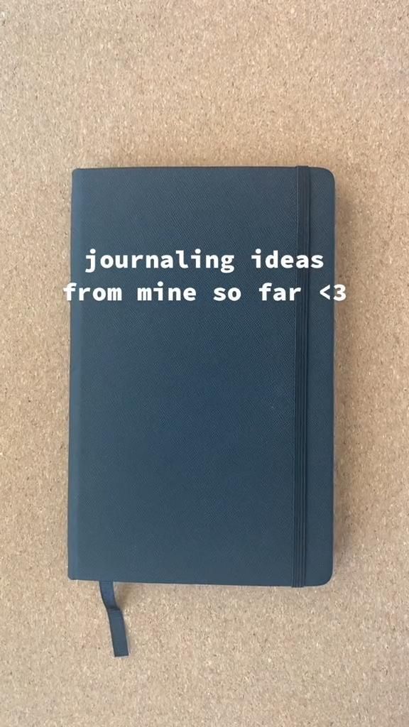 a notebook with the words journaling ideas from mine so far