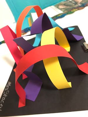 a piece of paper that has been cut out to look like an abstract sculpture