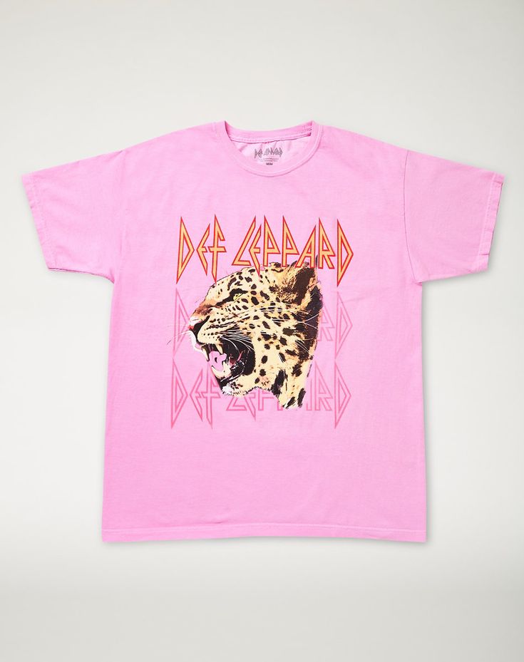 a pink shirt with an image of a leopard on it