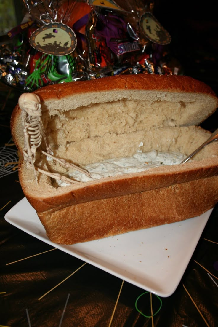 there is a skeleton in the bread on this plate