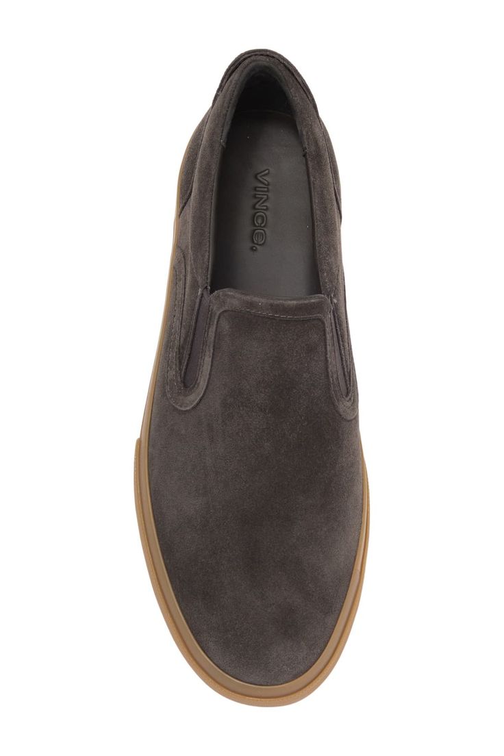 Luxe suede constructs this understated and stylish slip-on sneaker.Sizing: True to size. M=standard width. Round toe. Suede construction. Dual elastic gore insets. Slip-on. Lightly padded footbed. Lightly padded cuff. White sole. Imported Sneaker Men, Casual Shoe, Vans Classic Slip On Sneaker, Soft Suede, Slip On Sneaker, Nordstrom Rack, Casual Shoes, Loafers, Slip On