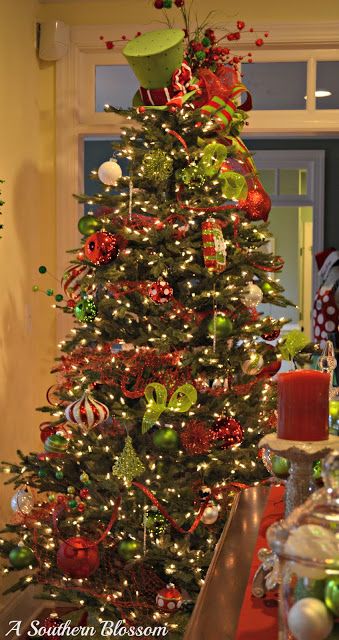 a decorated christmas tree in a living room